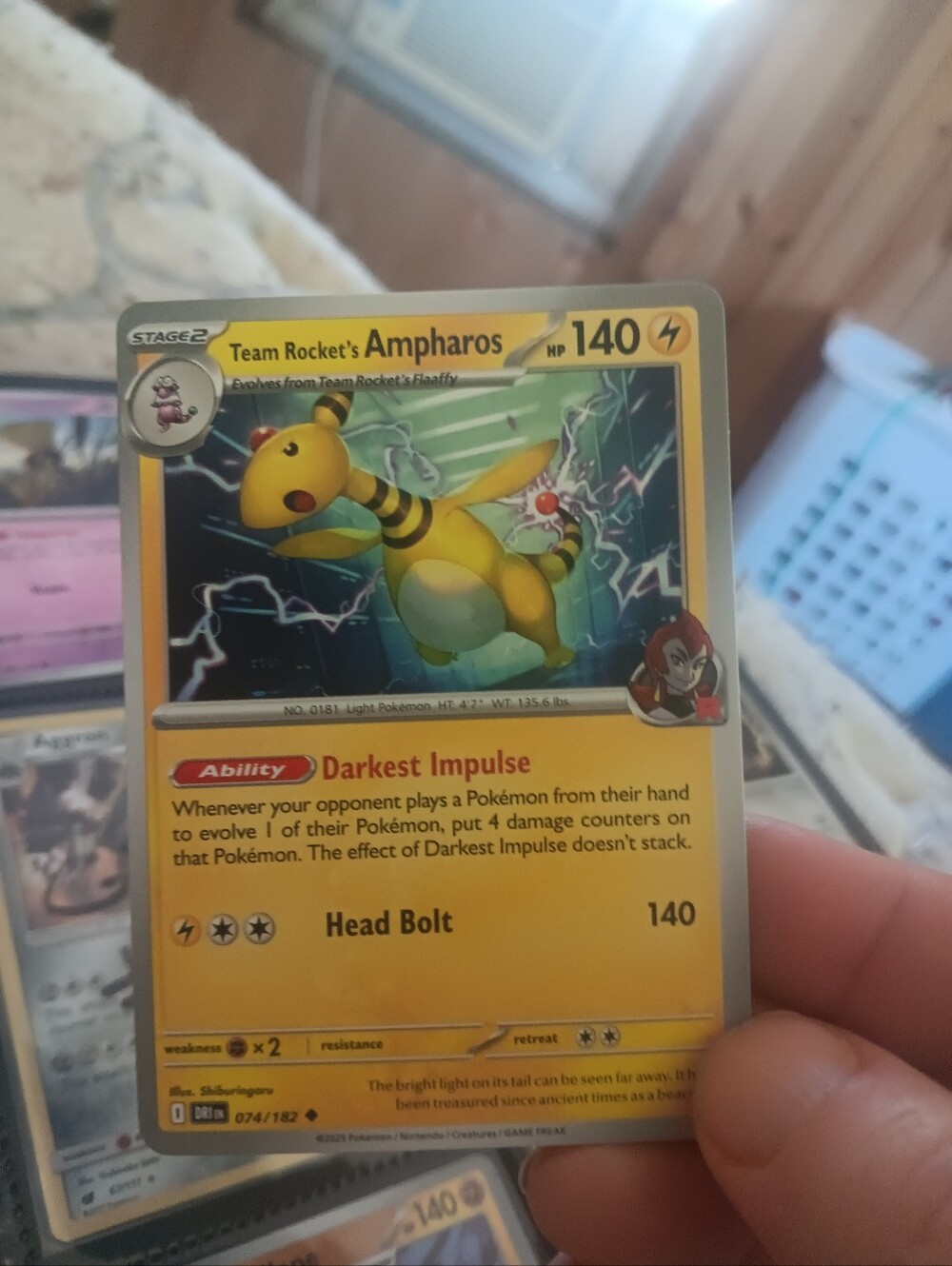 Pokemon Team Rocket's Ampharos Yellow and Black Trading Card